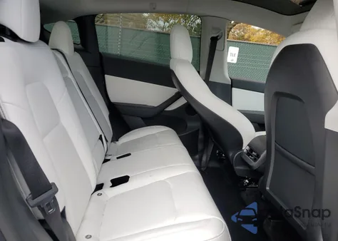 2022 Tesla Model Y from USA, damaged, VIN 7SAYGDEE6NF422585